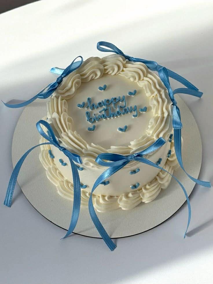 blue ribbon minimalist 1 Tier - white, blue theme with piped blue hearts on top and side