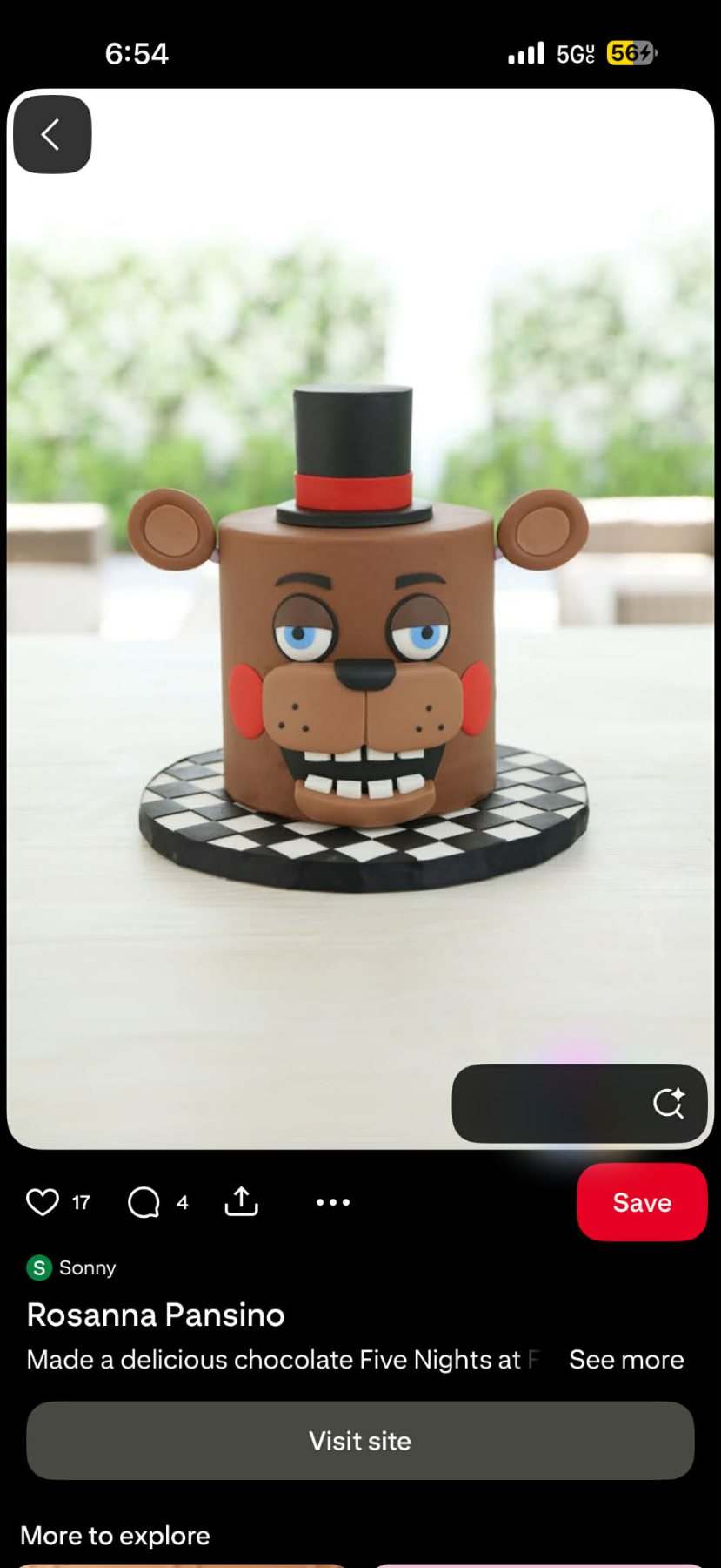 Chocolate Five Nights at Freddy's cake designed as Freddy Fazbear's head with a black top hat